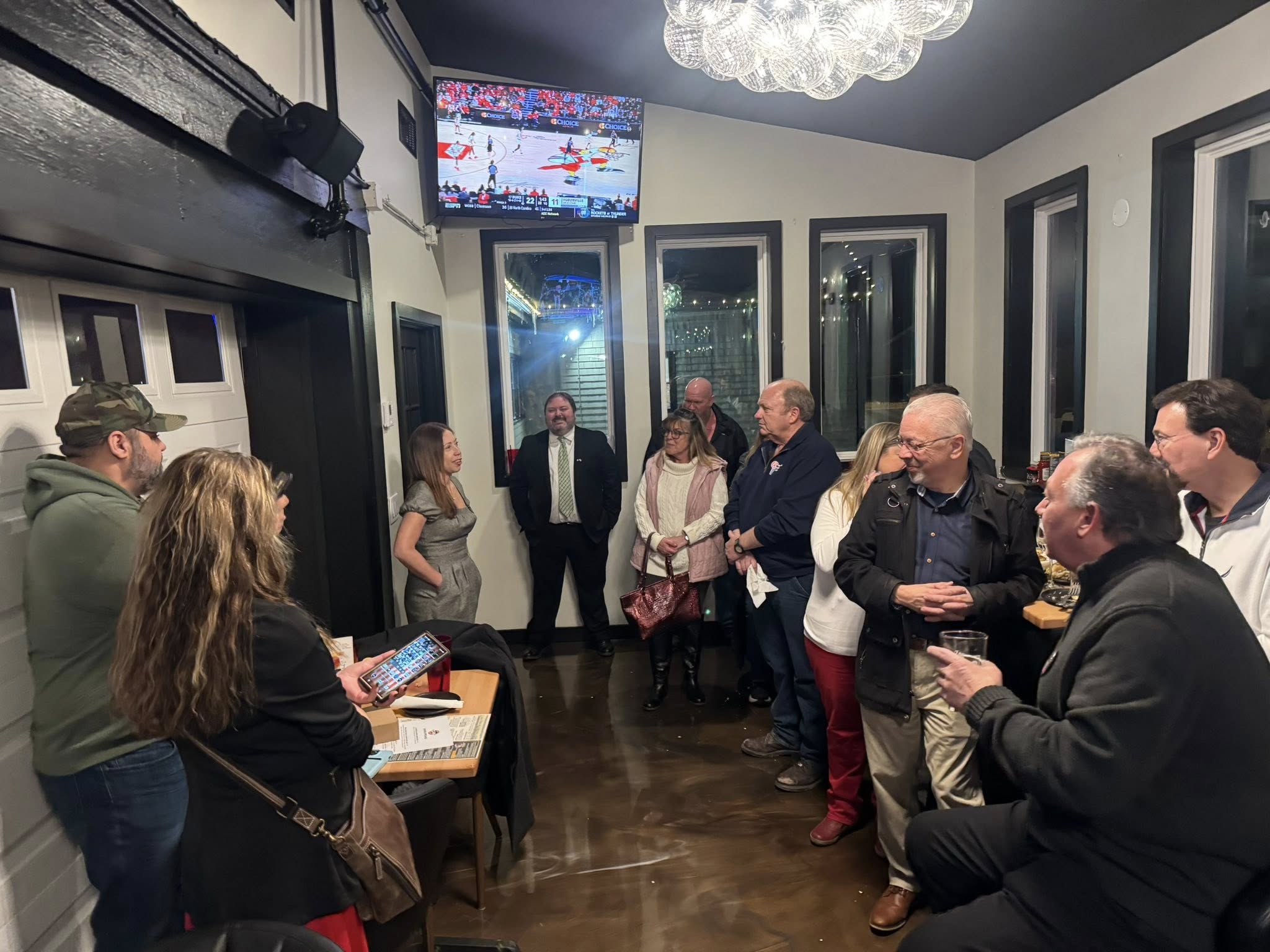 Anne Brensley meeting with supporters at a campaign event